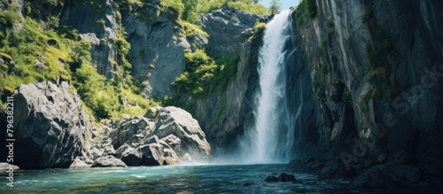 Waterfall cascading down mountain slope
