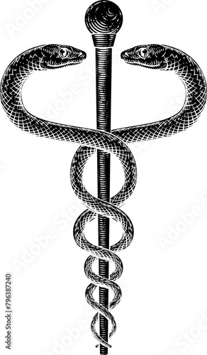A caduceus doctor medical snakes symbol in a vintage engraved retro style