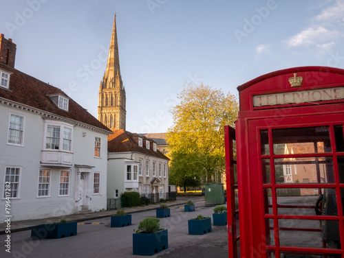 Telephone box and spire in a historic town
