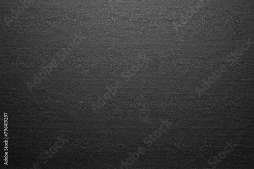 Clean dark black book cover, close-up, copy space.