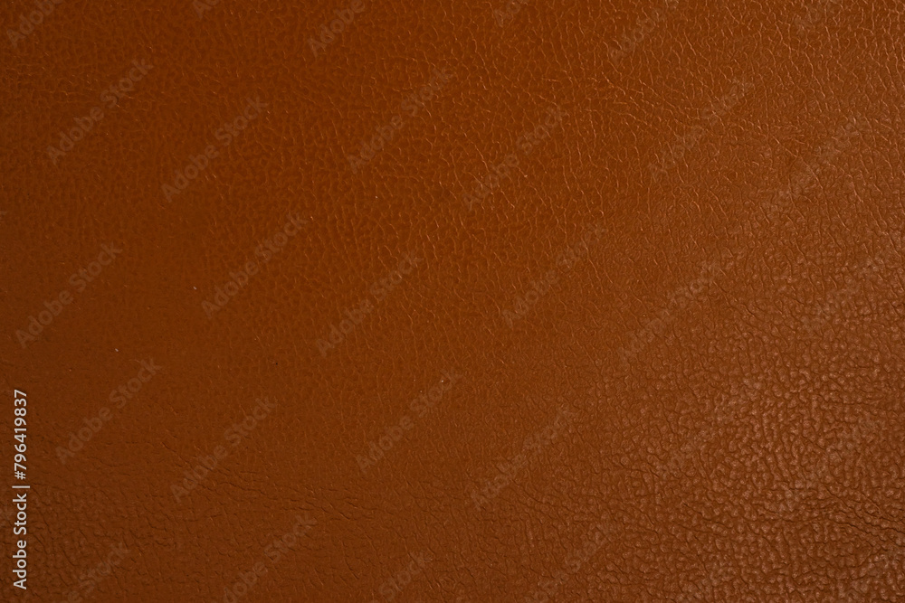 Clean brown book cover texture background, close-up, copy space. Clean brown book cover texture background, close-up, copy space.