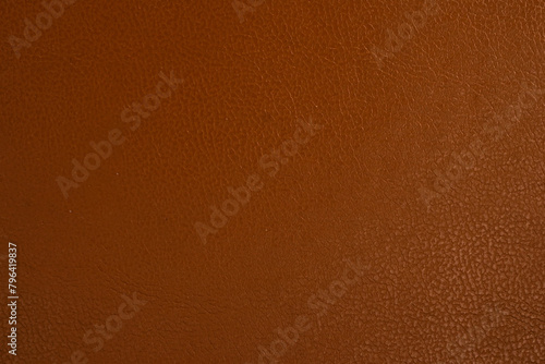 Clean brown book cover texture background, close-up, copy space.