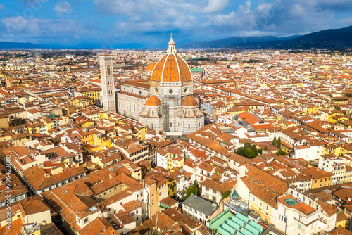 Panoramic erial cityscape view on the dome of Santa Maria del Fiore church and old town in Florence photo