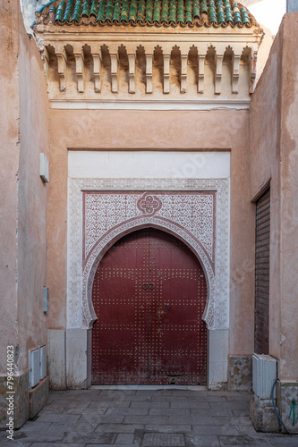 Arched doorway entrance to a building in the Marrakech Medina © parkerspics