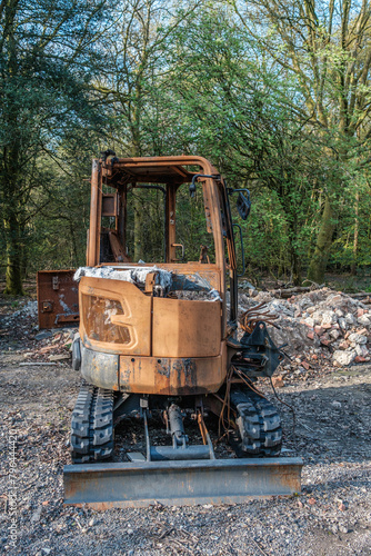 Burnt out excavator  construction vehicle on Hindhead Common
