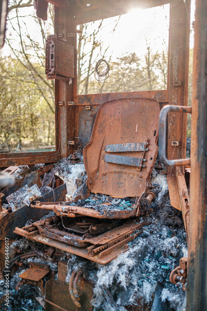 Burnt out excavator, construction vehicle on Hindhead Common