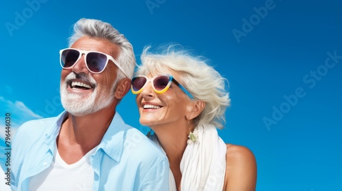 b'Happy retired couple enjoying the sunshine'