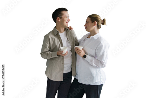 Young couple drinking coffee together hugging, cut out