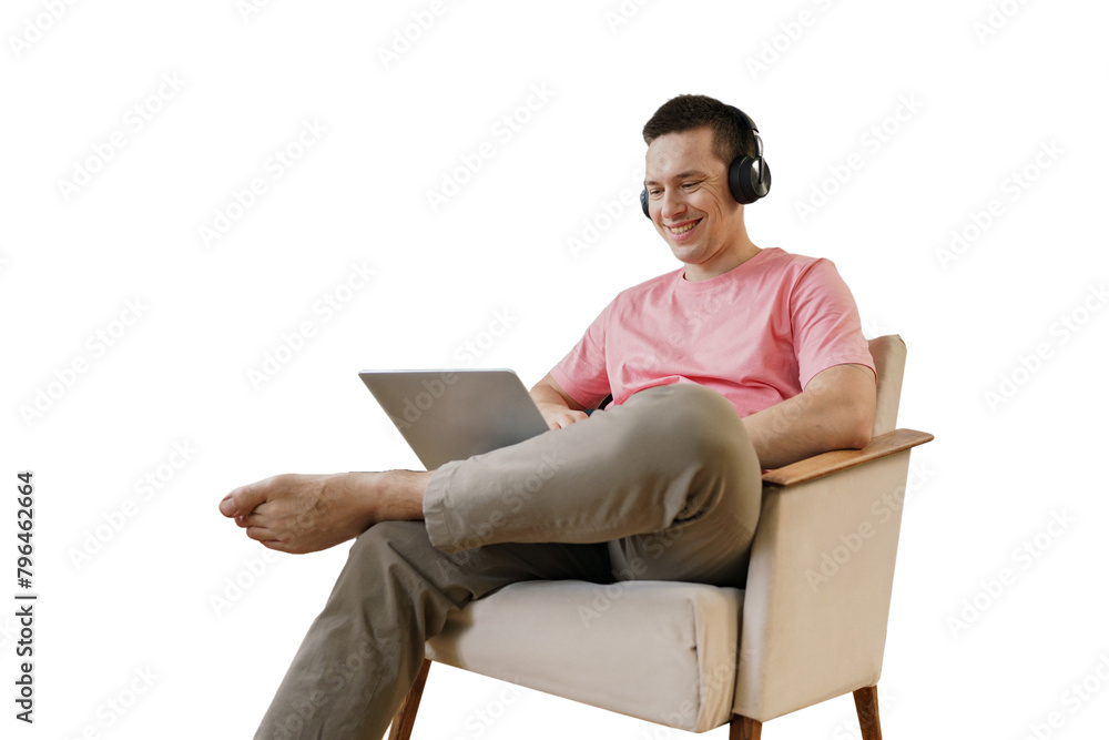 © muse studio - A male freelance programmer uses a laptop cut out © muse studio - A male freelance programmer uses a laptop cut out