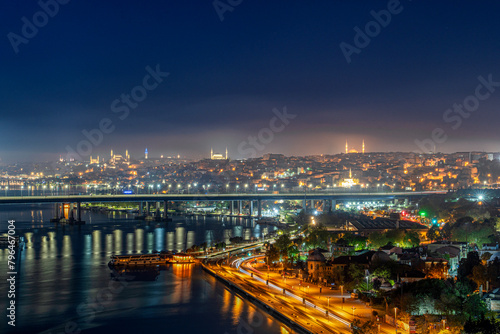View of Istanbul from Pierre Loti Hill (Hill). Beautiful day cityscape with Golden Horn Bay, buildings and sky at sunrise time . Travel background for wallpaper or guidebook photo