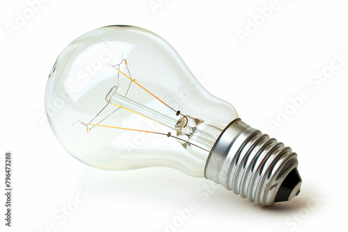 Clear Incandescent Light Bulb Against White Background photo