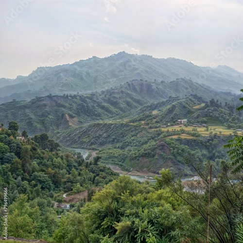 The image depicts a landscape with trees and mountains in the background. It captures the natural beauty of the outdoors with a cloudy sky and lush vegetation.