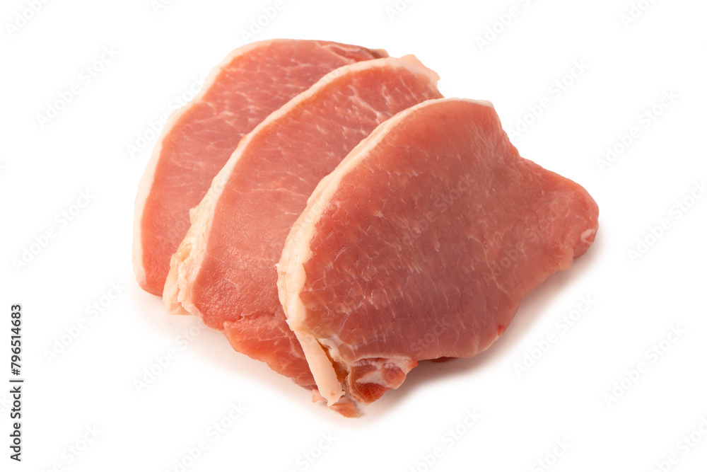 Raw pork pieces isolated on a white background.