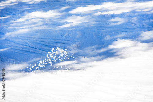 abstract background of a ski slope with snow from skis photo