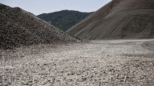 hills of gravel piled against the sky