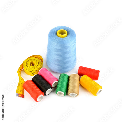 Set of threads for sewing and Measuring tape isolated on a white.