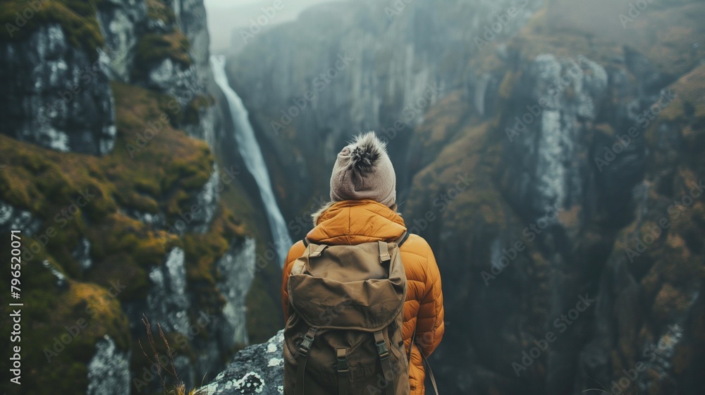 A Vertical View Of A Tourist With A Lake Mountain Scenery. A Vertical View Of A Tourist With A Lake Mountain Scenery.