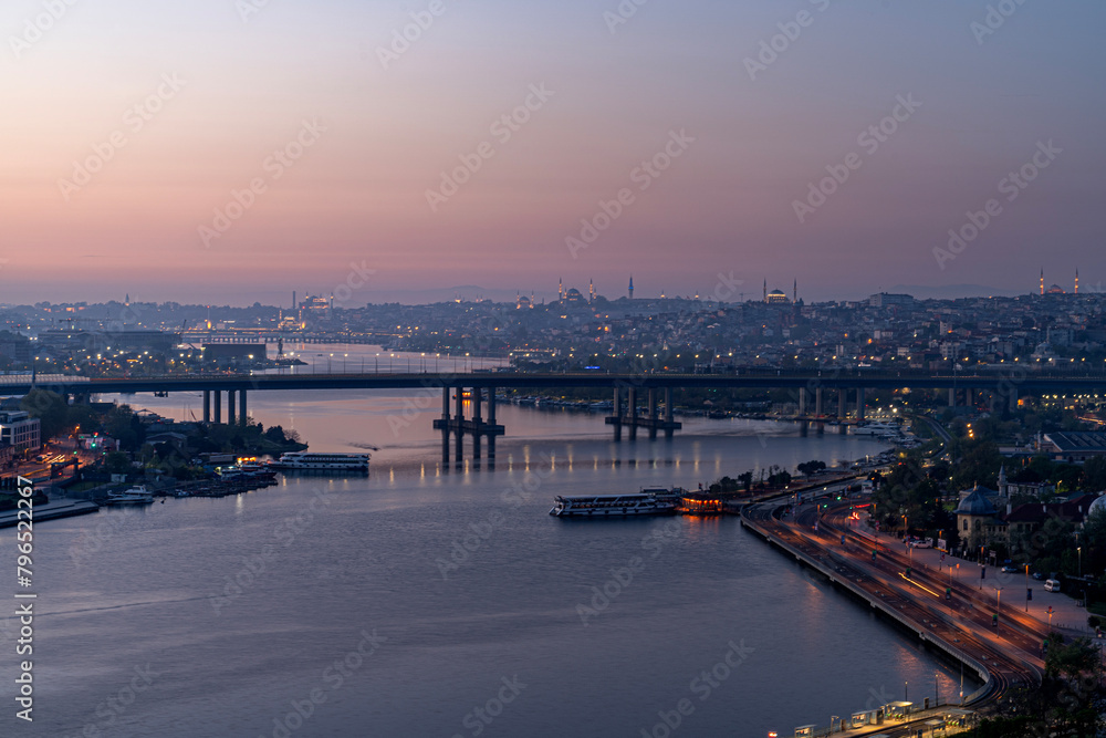 View of Istanbul from Pierre Loti Hill (Hill). Beautiful day cityscape with Golden Horn Bay, buildings and sky at sunrise time . Travel background for wallpaper or guidebook