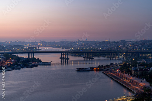 View of Istanbul from Pierre Loti Hill  Hill . Beautiful day cityscape with Golden Horn Bay  buildings and sky at sunrise time . Travel background for wallpaper or guidebook