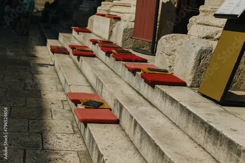 Red pillows on the steps in Split old town, Croatia.