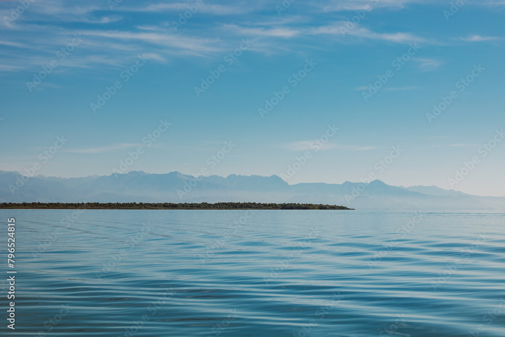Amazing view of Skadar Lake and beautiful mountains on a sunny morning. Travel destination in Montenegro.