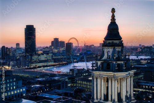 Afternoon in London, England, at Christmas Time, with The Thames and Blackfriars Bridge, and One of the Towers of St Paul's Cathedral photo