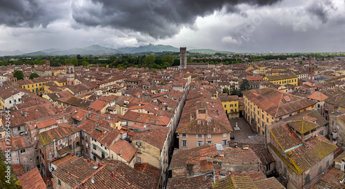 An aerial panoramic view of Lucca in Toskany, Italy during storm photo