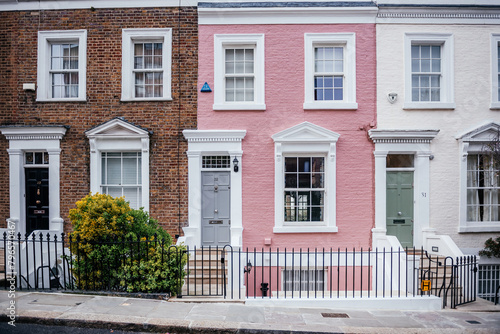 Row of Traditional British Houses with Pink Facade photo