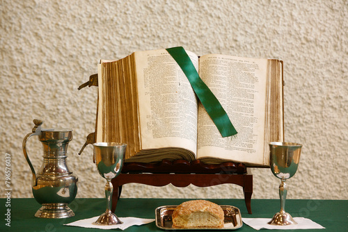 Protestant  church. Bible, bread and wine in a temple.