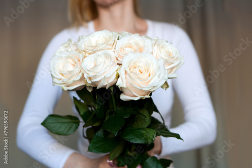 beige roses bouquet. Beautiful Rose Bouquet in woman hands