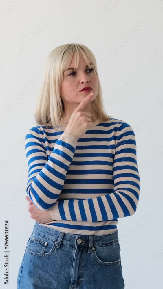 Thoughtful Caucasian woman brainstorming, pointing finger up, having brilliant idea and getting be happy on white background. Vertical video. Thoughtful Caucasian woman brainstorming, pointing finger up, having brilliant idea and getting be happy on white background. Vertical video.