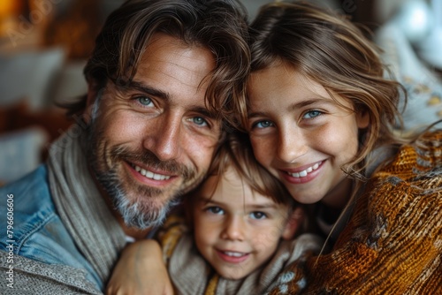 A close-up family portrait focusing on a child while surrounded by loving parents, depicting intimacy and a happy home
