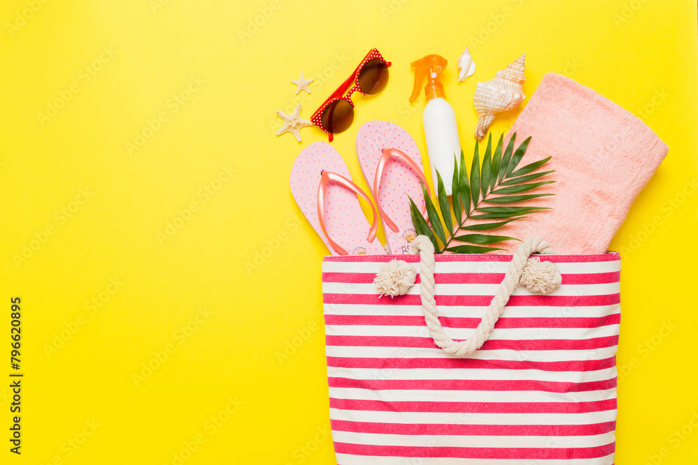 Naklejka premium Composition with stylish beach accessories on colored background, top view. Beach fashion flat lay, summer concept. Trendy colors