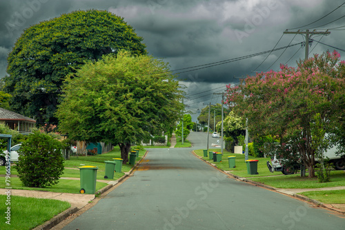 Rain and storm clouds and suburban street. photo