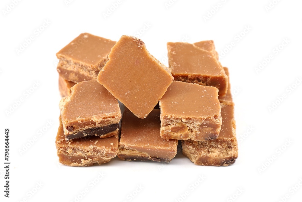 Stack of chocolate fudge with dried orange on white background. Stack of chocolate fudge with dried orange on white background.