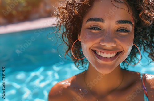 Woman in Bikini and Sunglasses Smiling photo