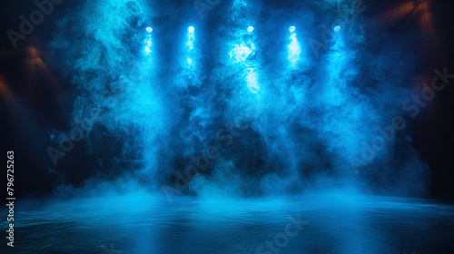 Blue spotlights with empty stage and smokey black background