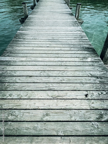 wooden pier on the lake © Monika
