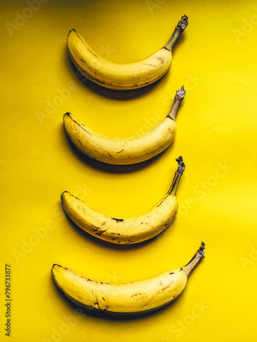 bananas on a yellow background © Monika