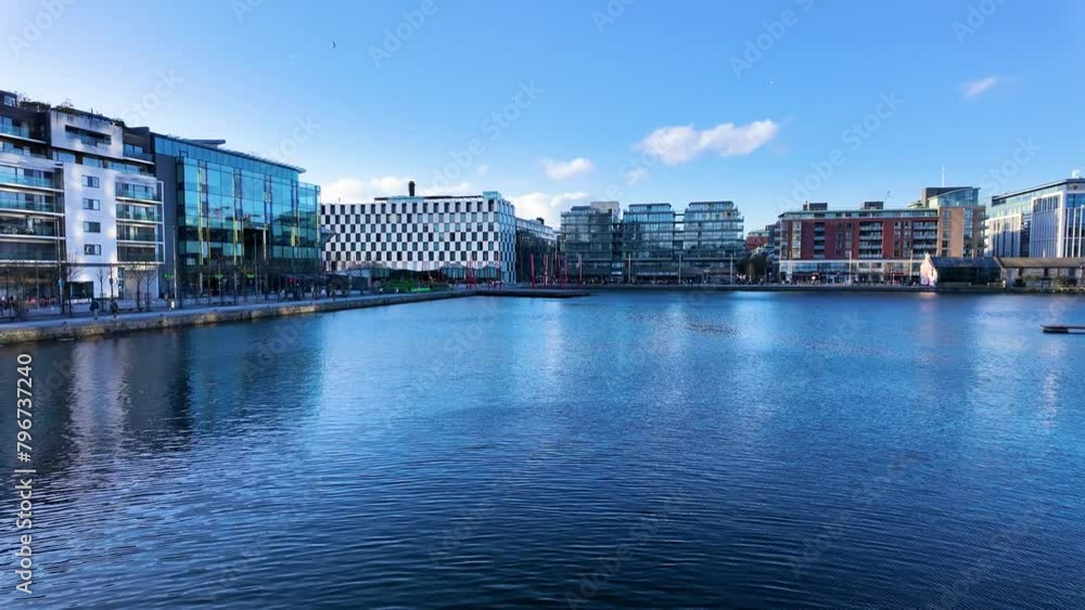 Panoramic View Of Grand Canal Dock From Grand Canal Square In Dublin Docklands. Symbol of urban regeneration and technological advancement. With modern architecture and corporate headquarters Panoramic View Of Grand Canal Dock From Grand Canal Square In Dublin Docklands. Symbol of urban regeneration and technological advancement. With modern architecture and corporate headquarters