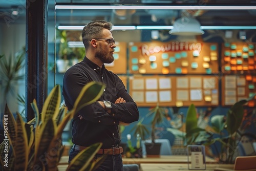 Recruitment concept image with a young man recruitment consultant manager in office next to a sign Recruiting