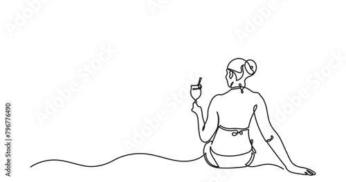 Continuous line drawing of a slender young woman sitting on the beach and holding a cocktail. Back view girl enjoys summer vacation. One-line drawing vector illustration.