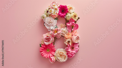 Top View Floral Arrangement Number Eight on Pink. Top view of number 8  with pink and white flowers arranged on a pink background.