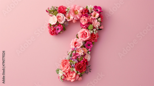 Top View Floral Number Seven. Top view of a floral arrangement shaping the number 7, ideal for celebrations.