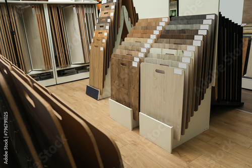 Many different samples of wooden flooring in store