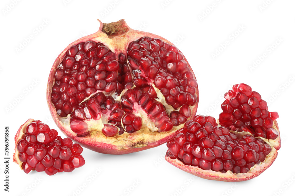Fresh cut pomegranate with juicy seeds isolated on white Fresh cut pomegranate with juicy seeds isolated on white
