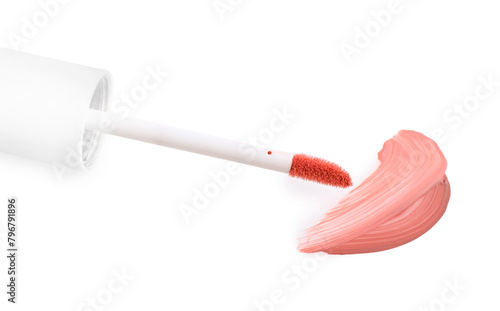 Strokes of color lip glosses and applicator isolated on white