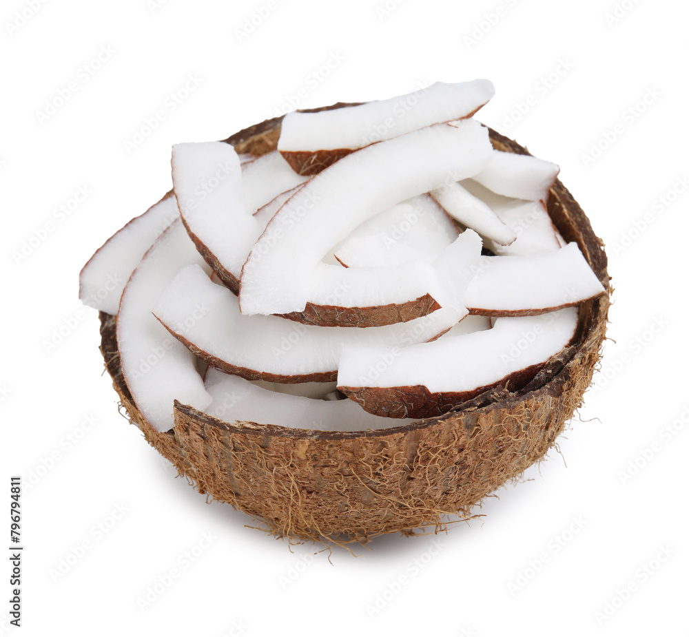Fototapeta premium Fresh coconut pieces in nut shell isolated on white