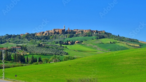 panorama of the Tuscan countryside in the Val d'Orcia in the province of Siena, Italy with the city of Pienza in the background photo