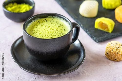 Perfectly Frothed Matcha Tea in Stylish Black Cup